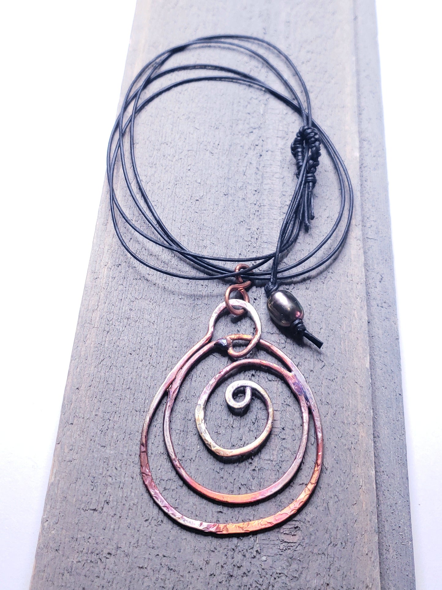 Fire painted copper spiral