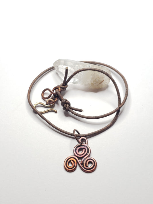 Fire painted triskelle symbol choker