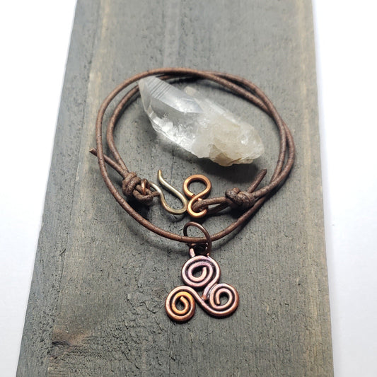 Fire painted triskelle symbol choker